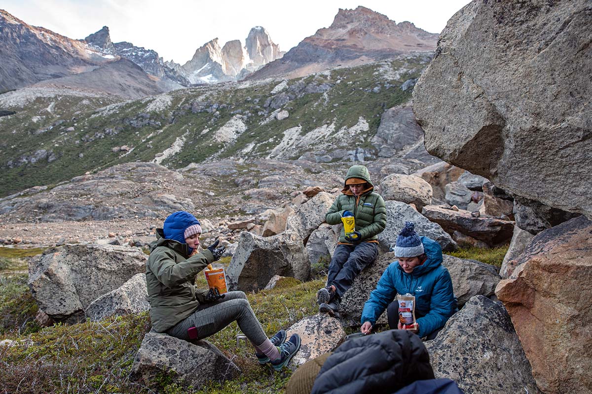 Eating dinner with Fitz Roy in the background (Feathered Friends Eos Down Jacket)