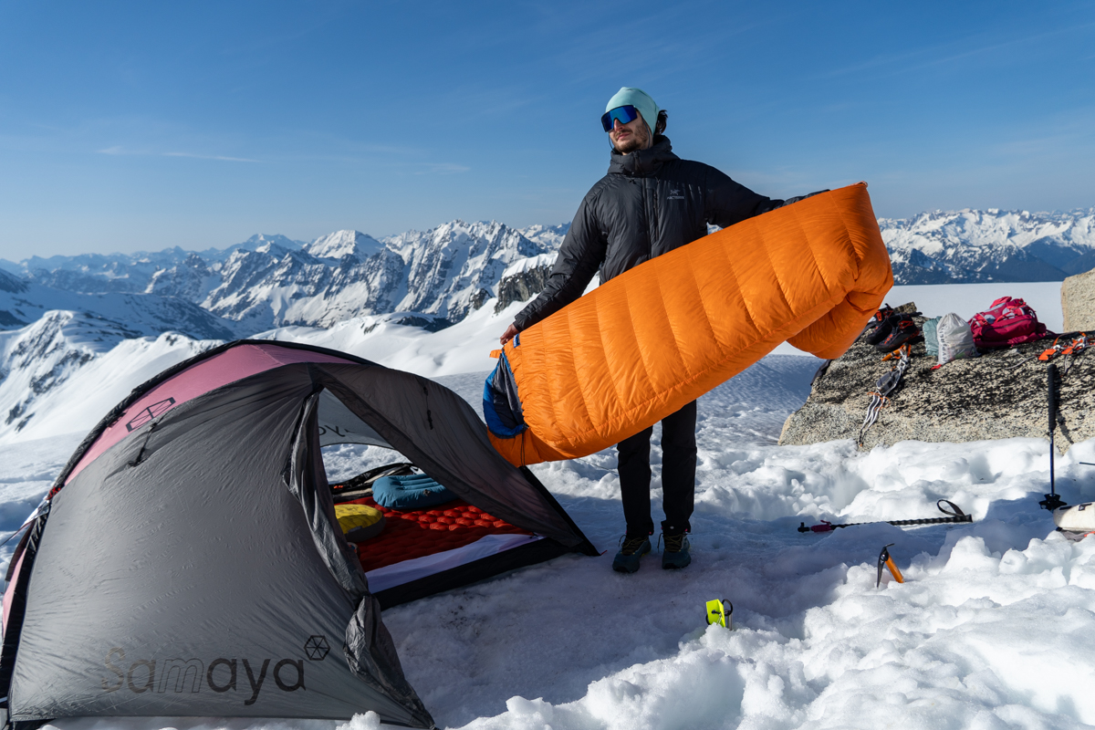 Feathered Friends Swallow UL 20 (holding bag outside tent)