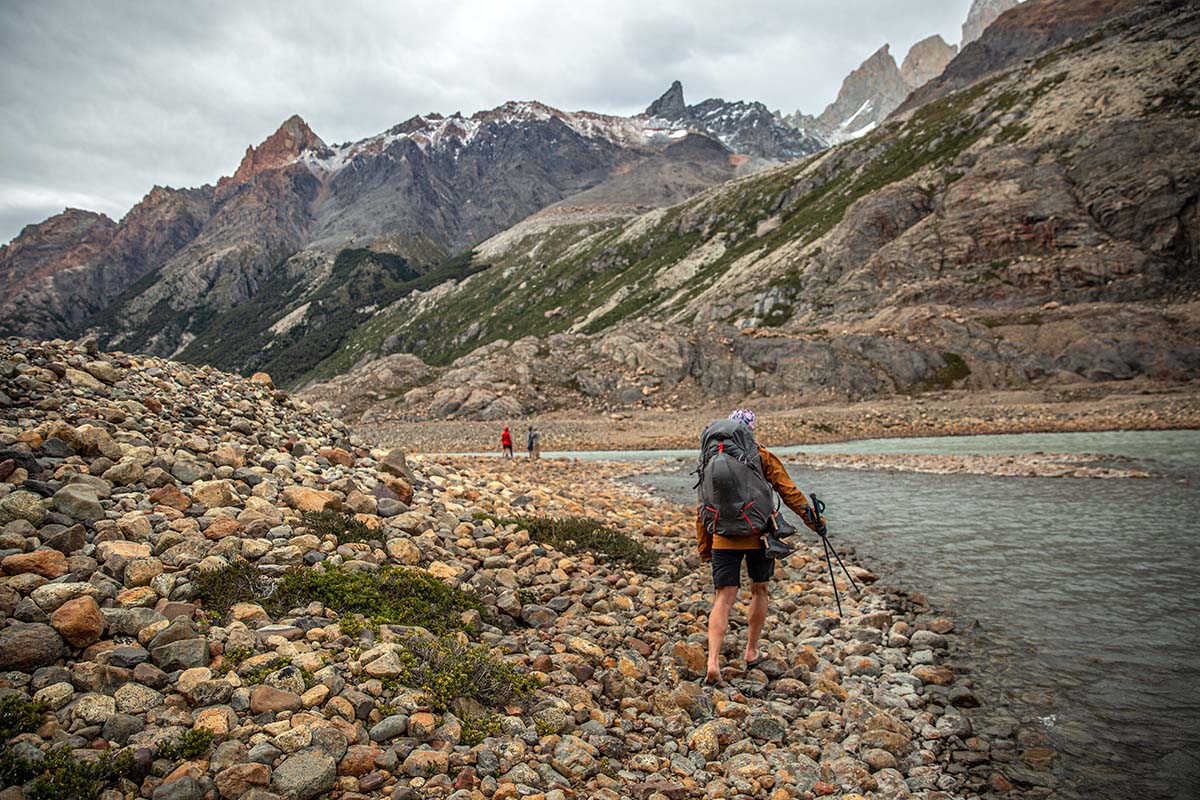 Gregory Facet 55 backpacking pack (walking beside river)