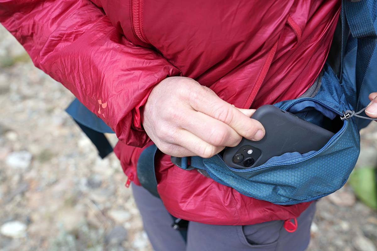 Gregory Paragon 58 backpacking pack (putting phone in zip hipbelt pocket)