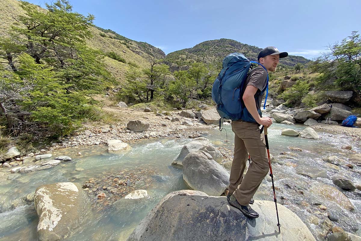 Gregory Paragon 58 backpacking pack (side profile near river)