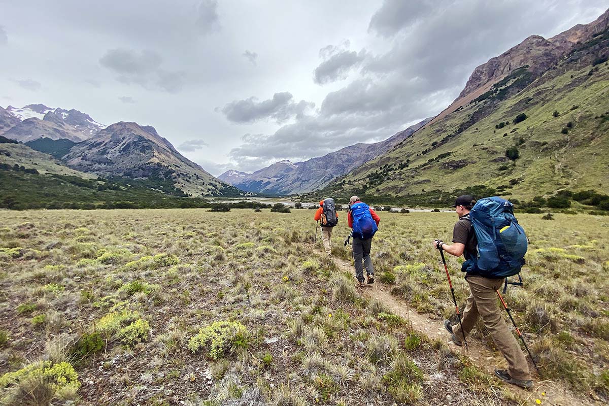 Gregory Paragon 58 backpacking pack (walking in wide river valley)