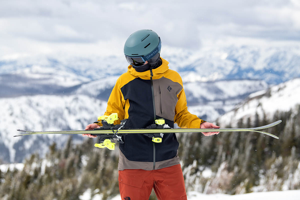 Head Kore 93 all-mountain ski (holding skis)