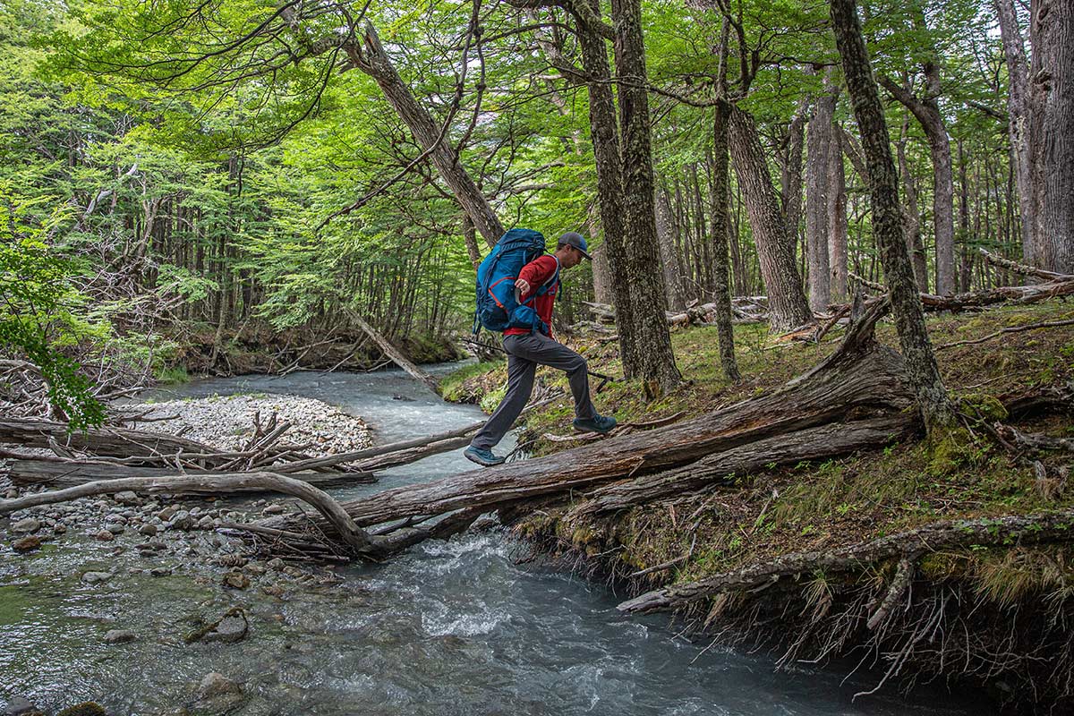 Hoka Kaha 2 GTX hiking boot (balancing on a log crossing a creek)