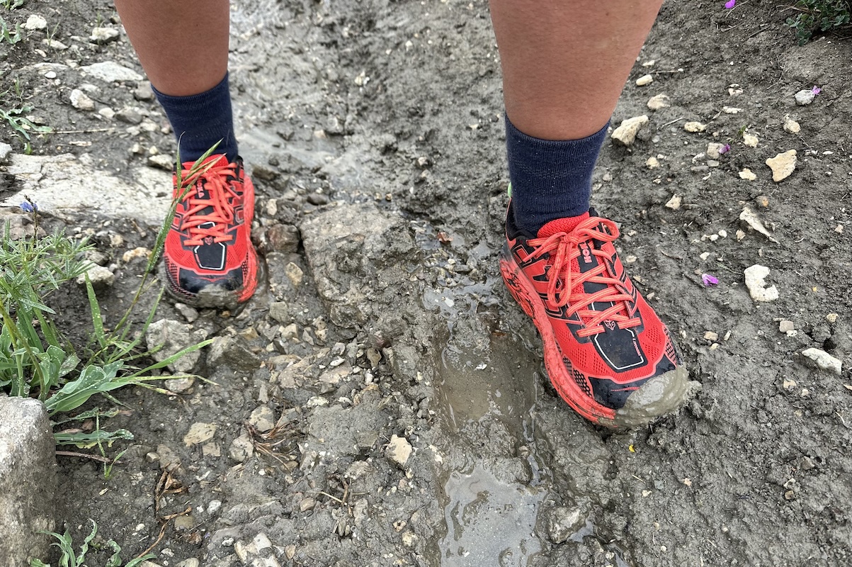 the hoka speedgoat 2 trail running shoes in the mud 