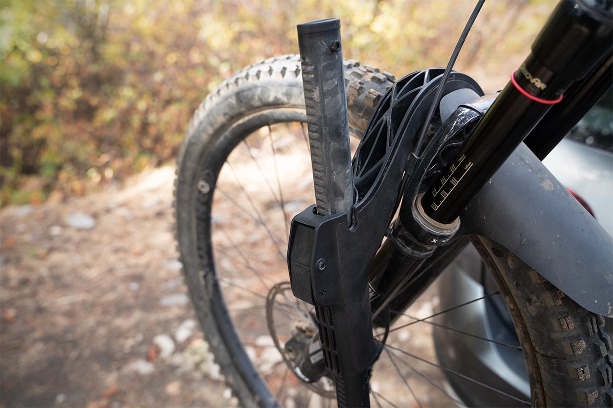 Kuat Transfer V2 hitch bike rack (hook arm secured on tire)