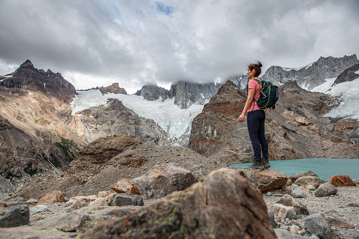 Lowa Renegade GTX Mid hiking boot (standing on rock above lake)