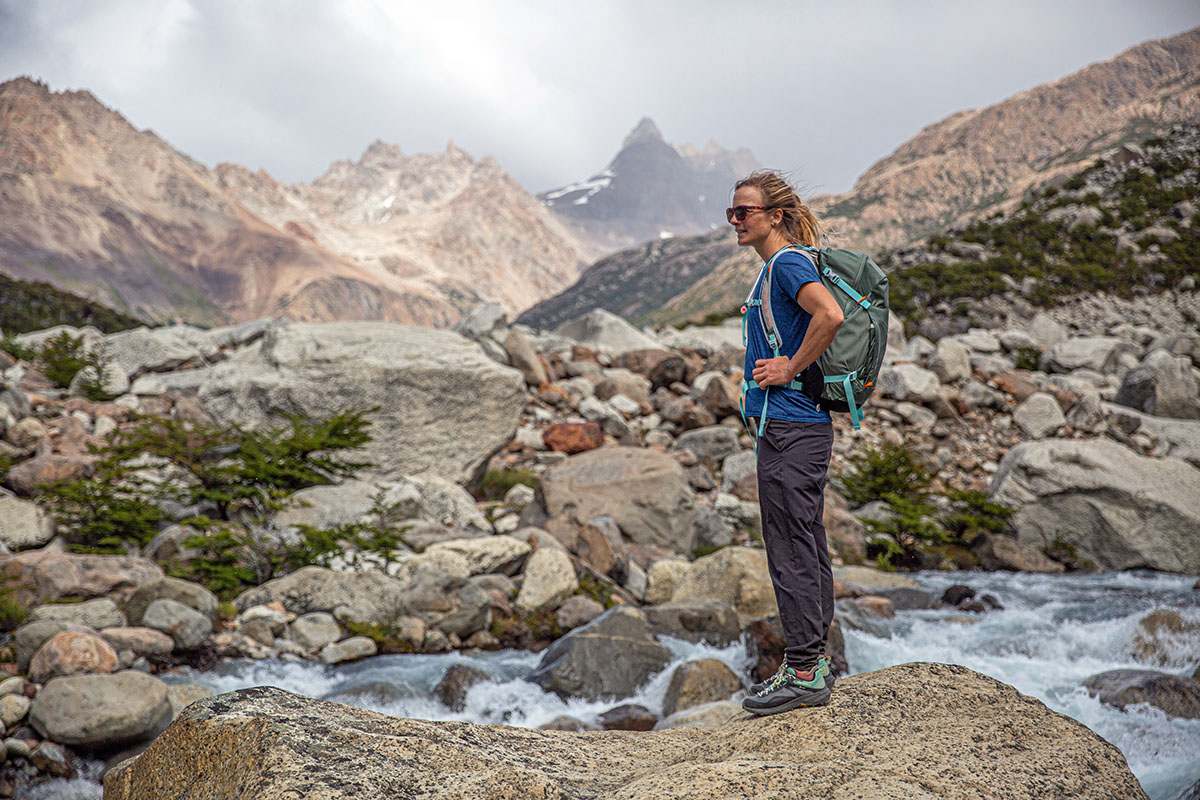 Merrell MQM 3 GTX hiking shoe (standing on rock near river 2)