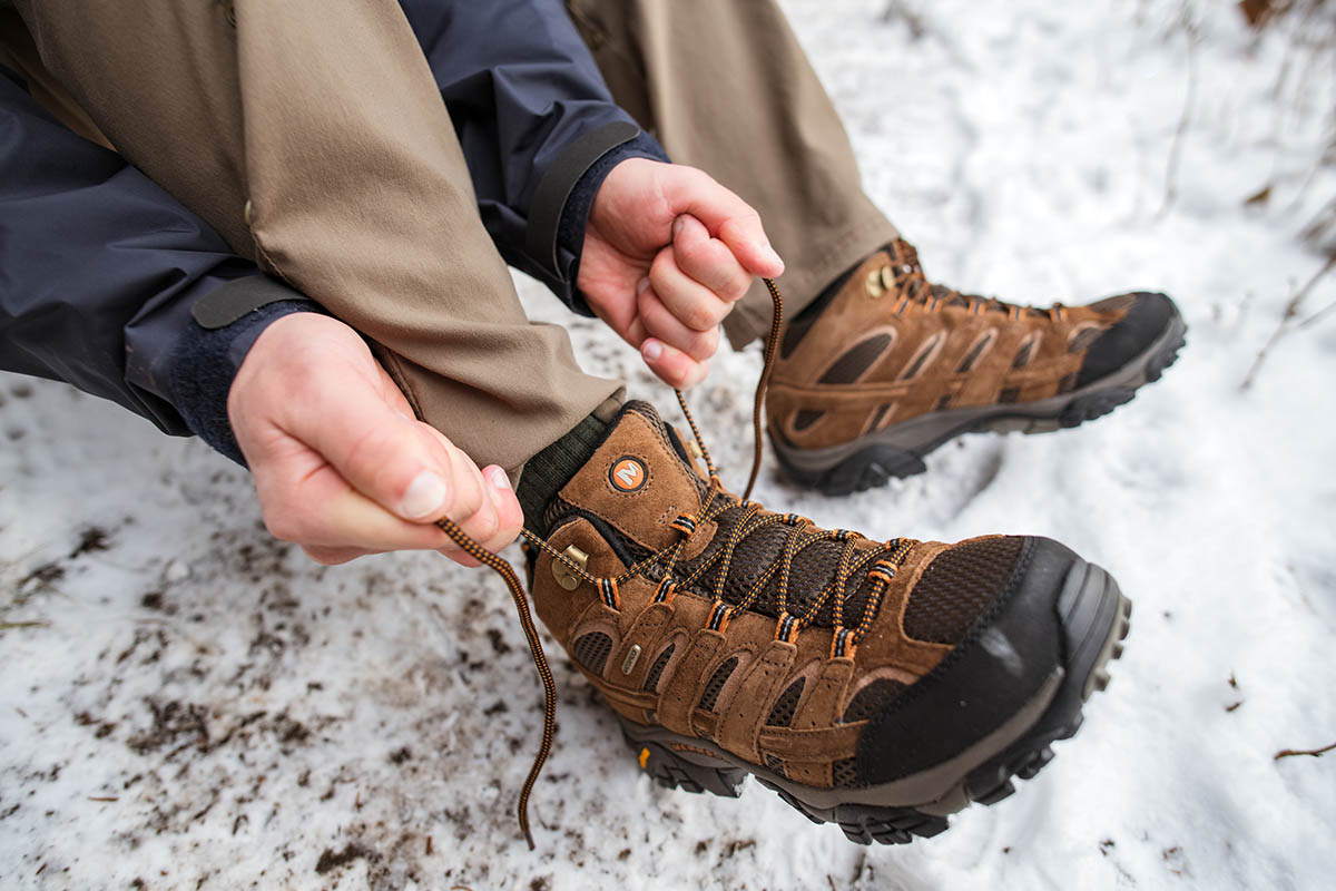 Merrell Moab 2 Mid hiking boot (lacing up)