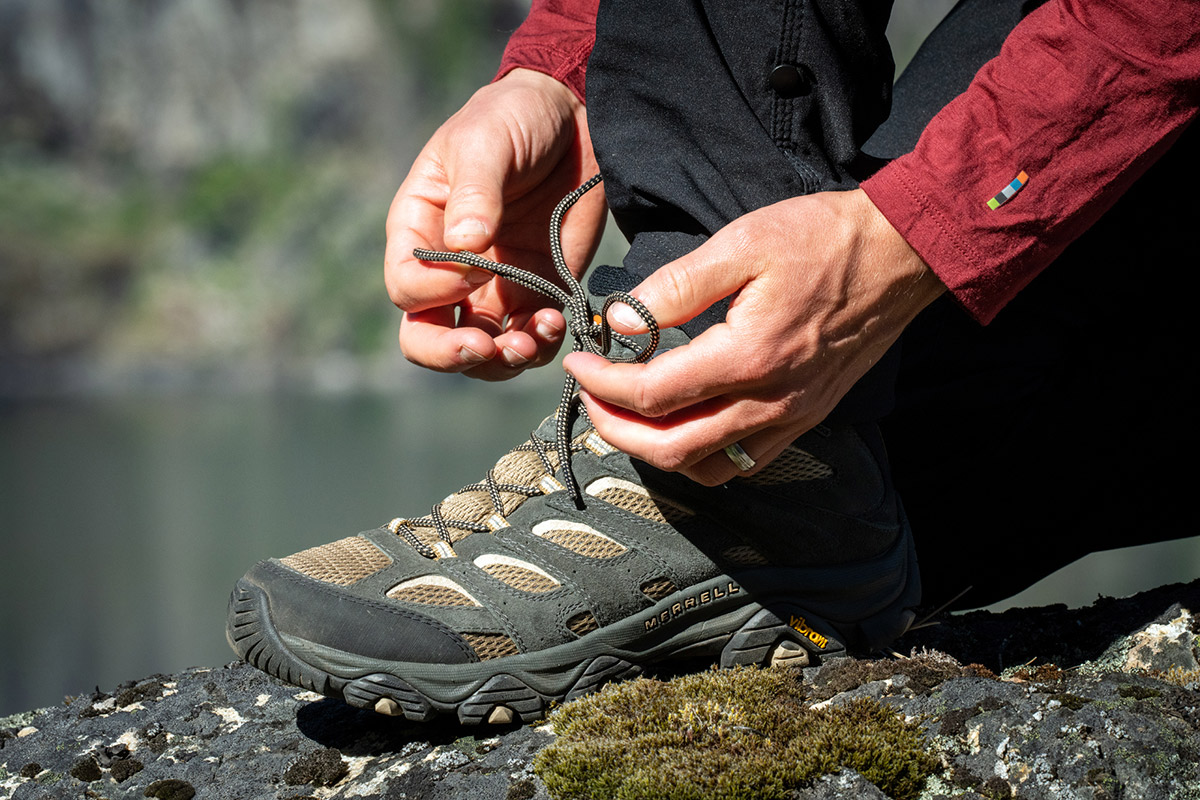 Merrell Moab 3 Mid Hiking Boot (lacing up)