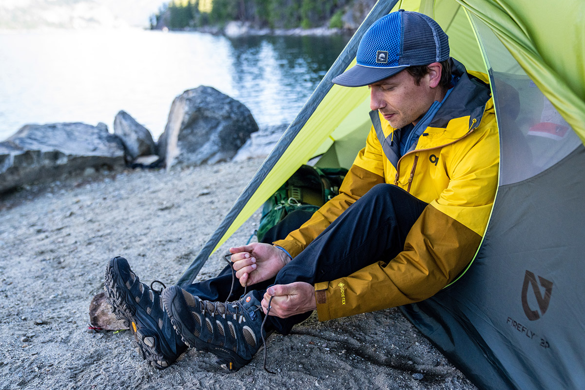 Merrell Moab 3 Mid Hiking Boot (tying shoe in tent)