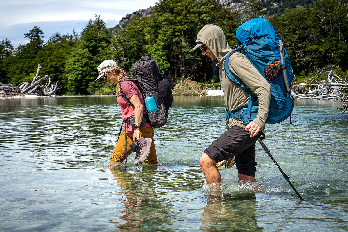 Nnormal Tomir Waterproof hiking boots (holding boots while crossing river)