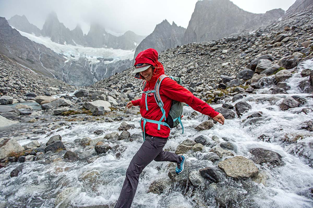 Norrøna Falketind Gore-Tex Paclite Jacket (jumping across stream)