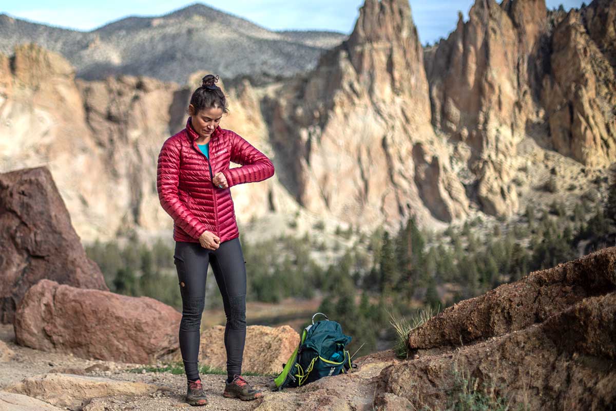 Norrona Trollveggen Superlight Down850 Jacket (zipping up jacket at Smith Rock)