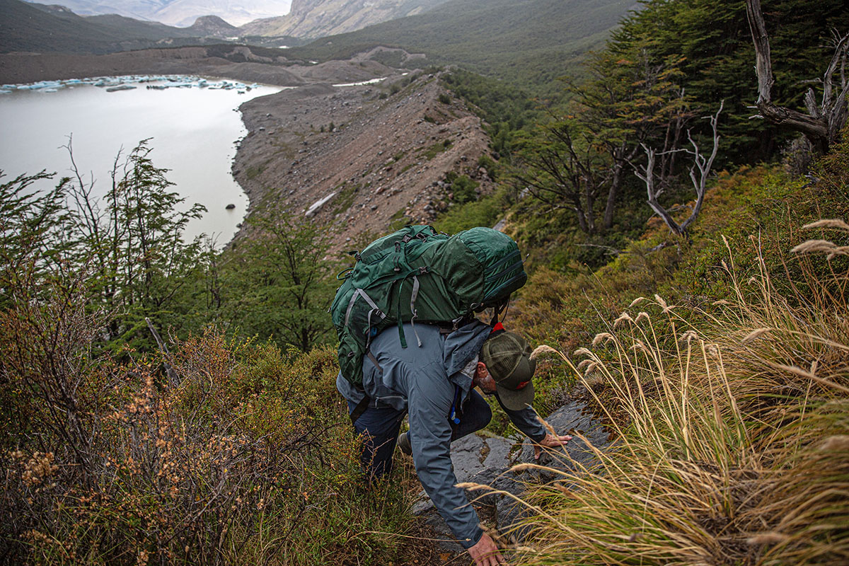 Osprey Aether Plus 70 backpacking pack (hiking up steep slope)