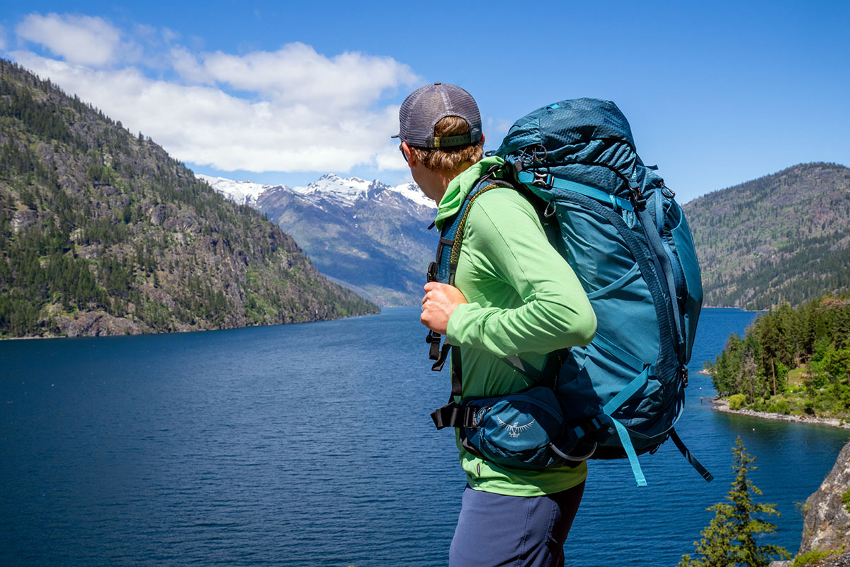 ​​Osprey Atmos AG 65 backpacking pack (from side overlooking lake)