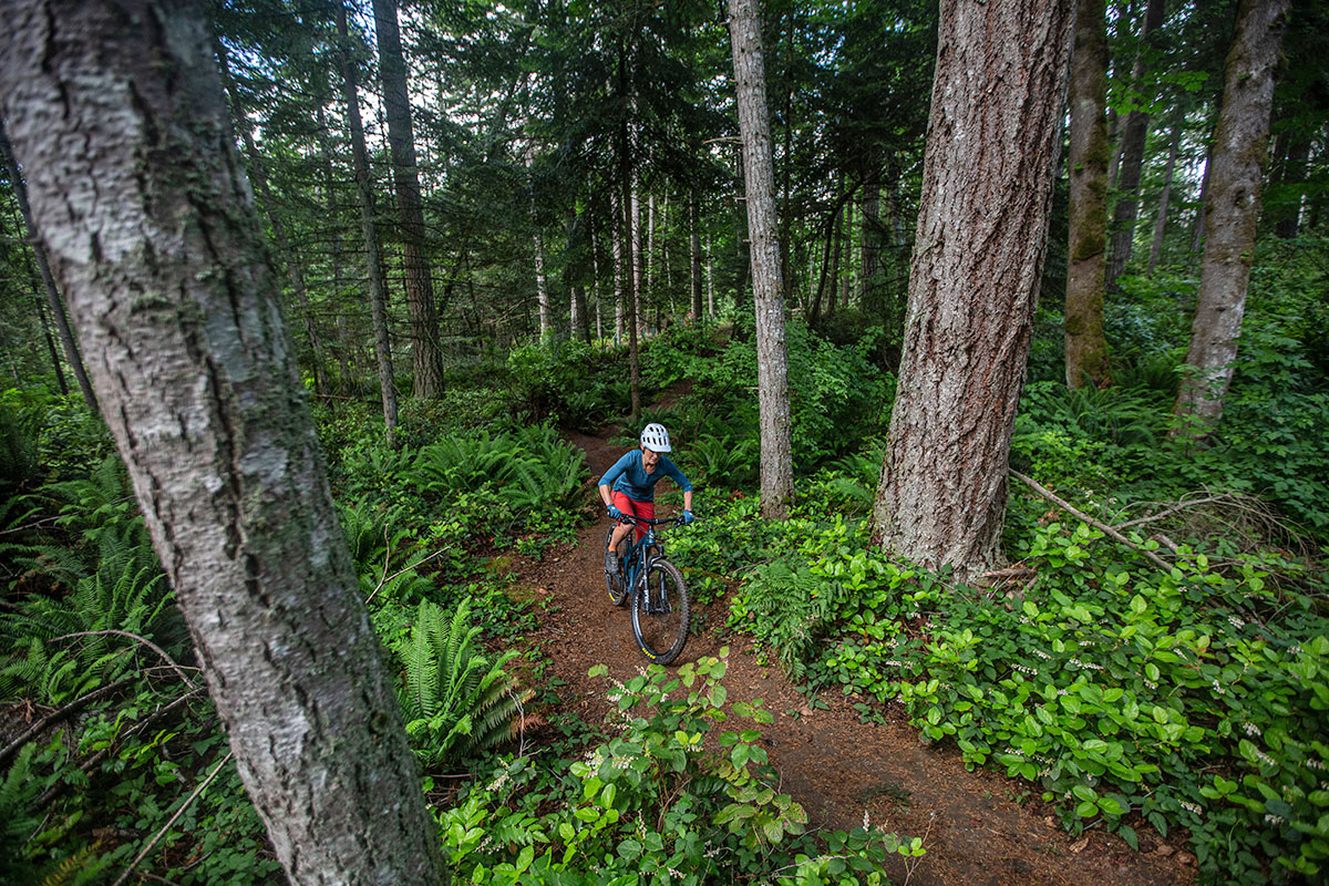 POC Kortal Race MIPS mountain bike helmet (riding on forest trail)