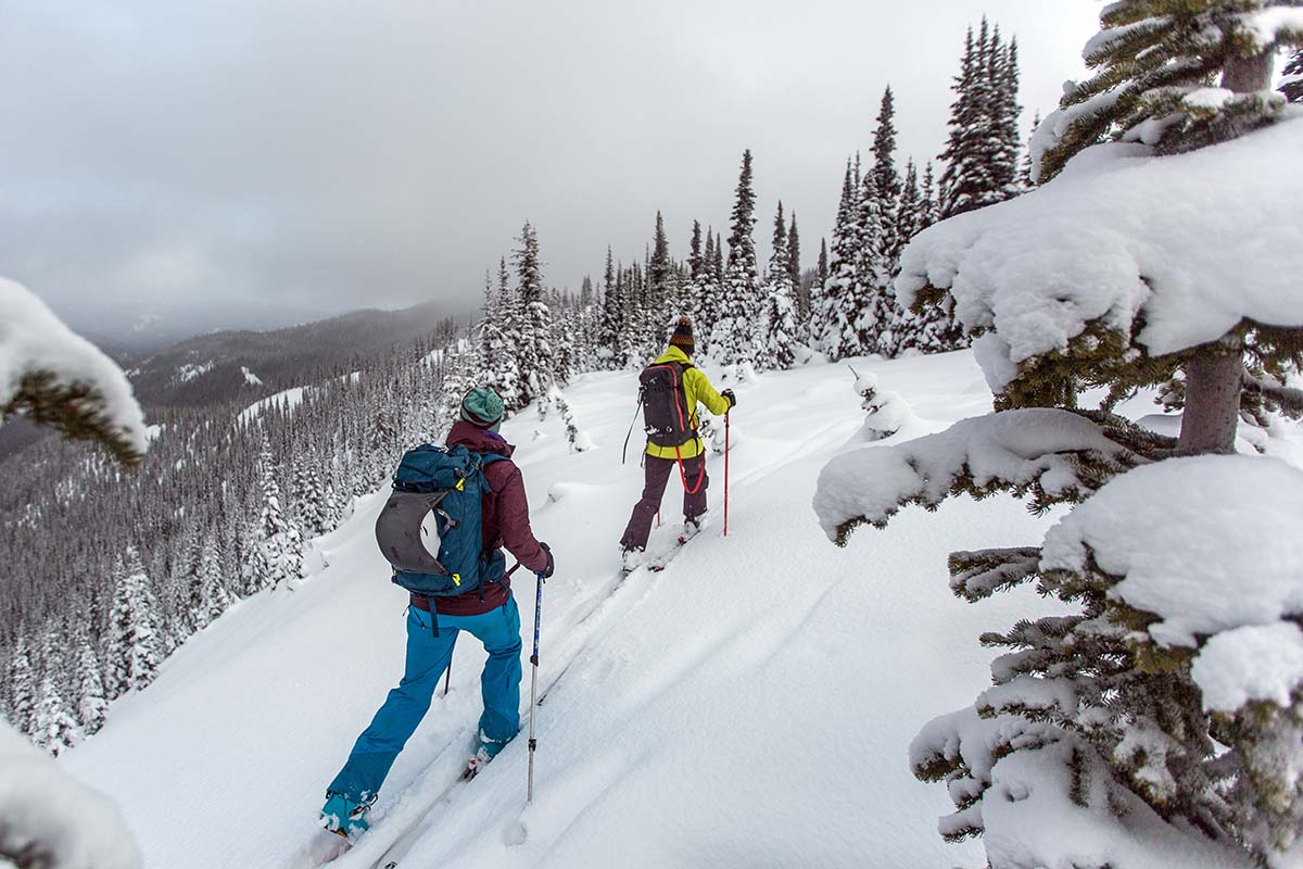 Ski touring wearing the Patagonia Descensionist 40L ski pack