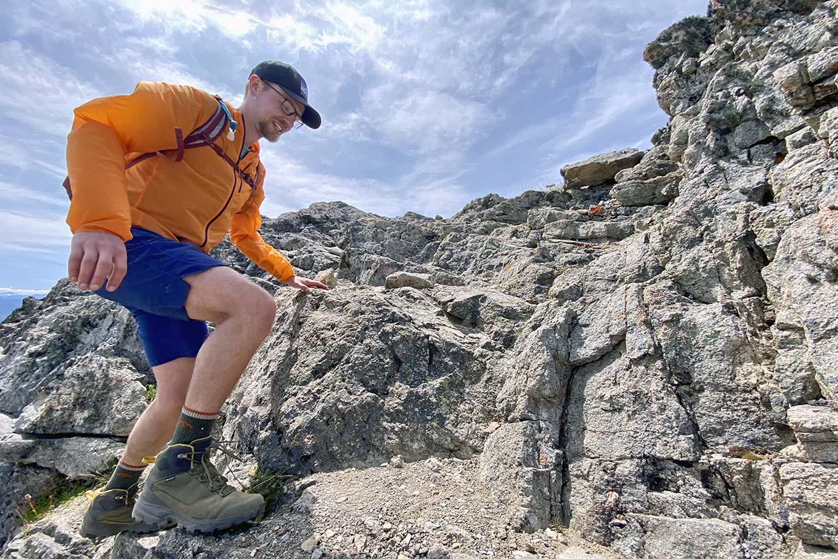 Patagonia Houdini windbreaker jacket (hiking up rocks)