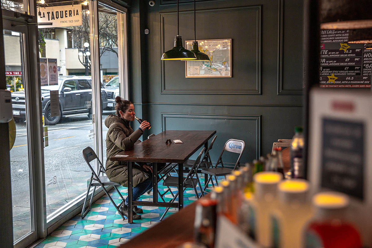 Patagonia Jackson Glacier Parka (sipping beer inside cafe)