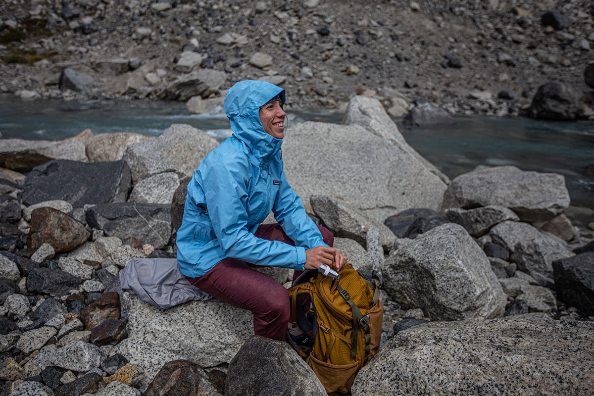 Patagonia Torrentshell 3L rain jacket (smiling by lake)