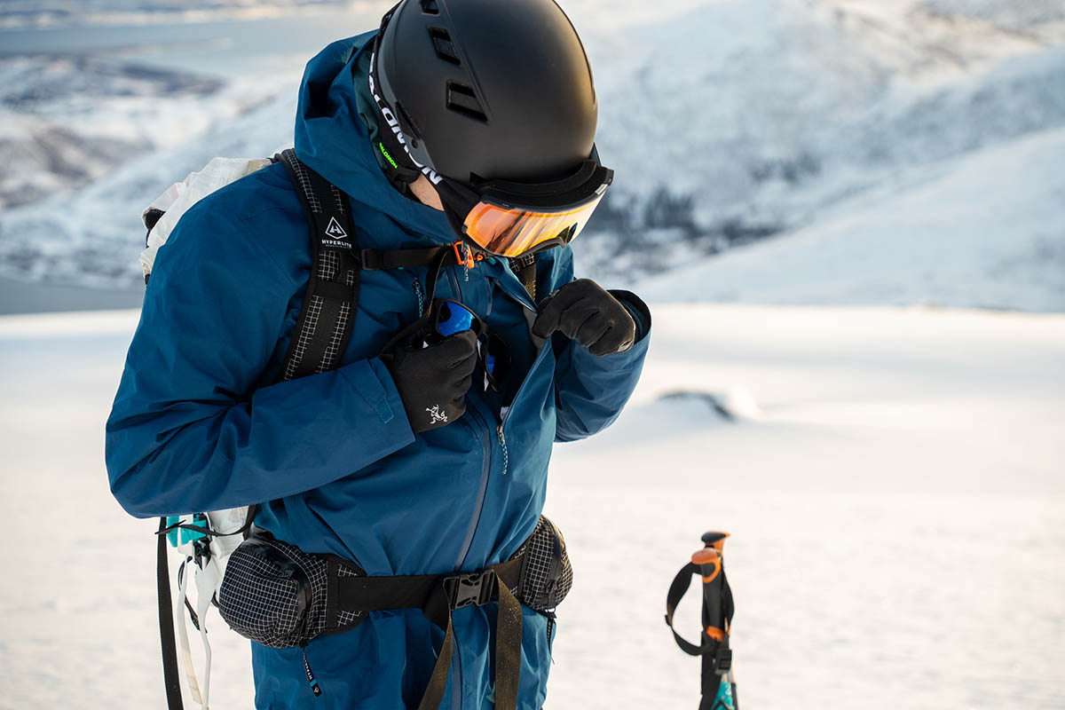 Patagonia Triolet Jacket (putting glasses in chest pocket)