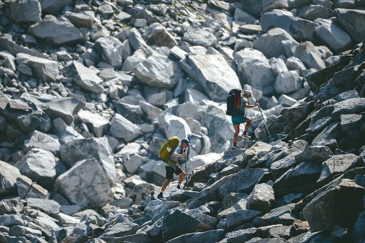 REI Co-op Flash 55 backpack (hiking up steep boulder field)