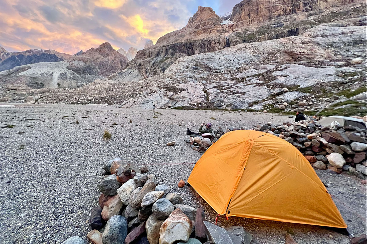 REI Co-op Trail Hut 2 backpacking tent (rain fly and sunset)