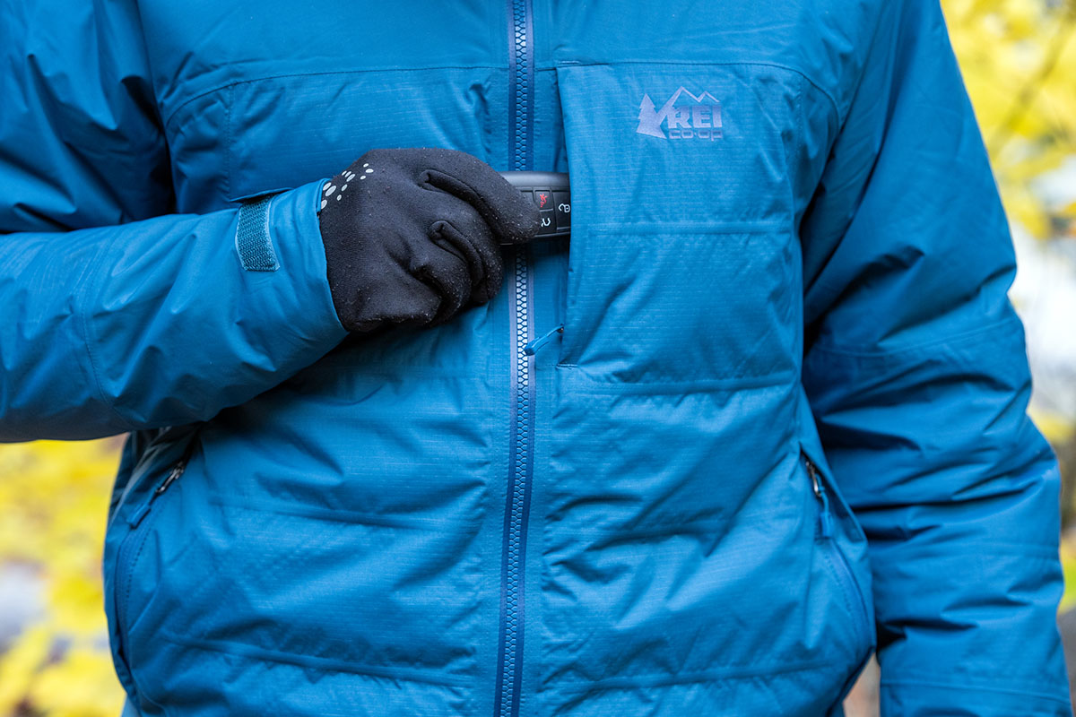 REI Co-op Stormhenge Down Hybrid Jacket (stowing keys in chest pocket)