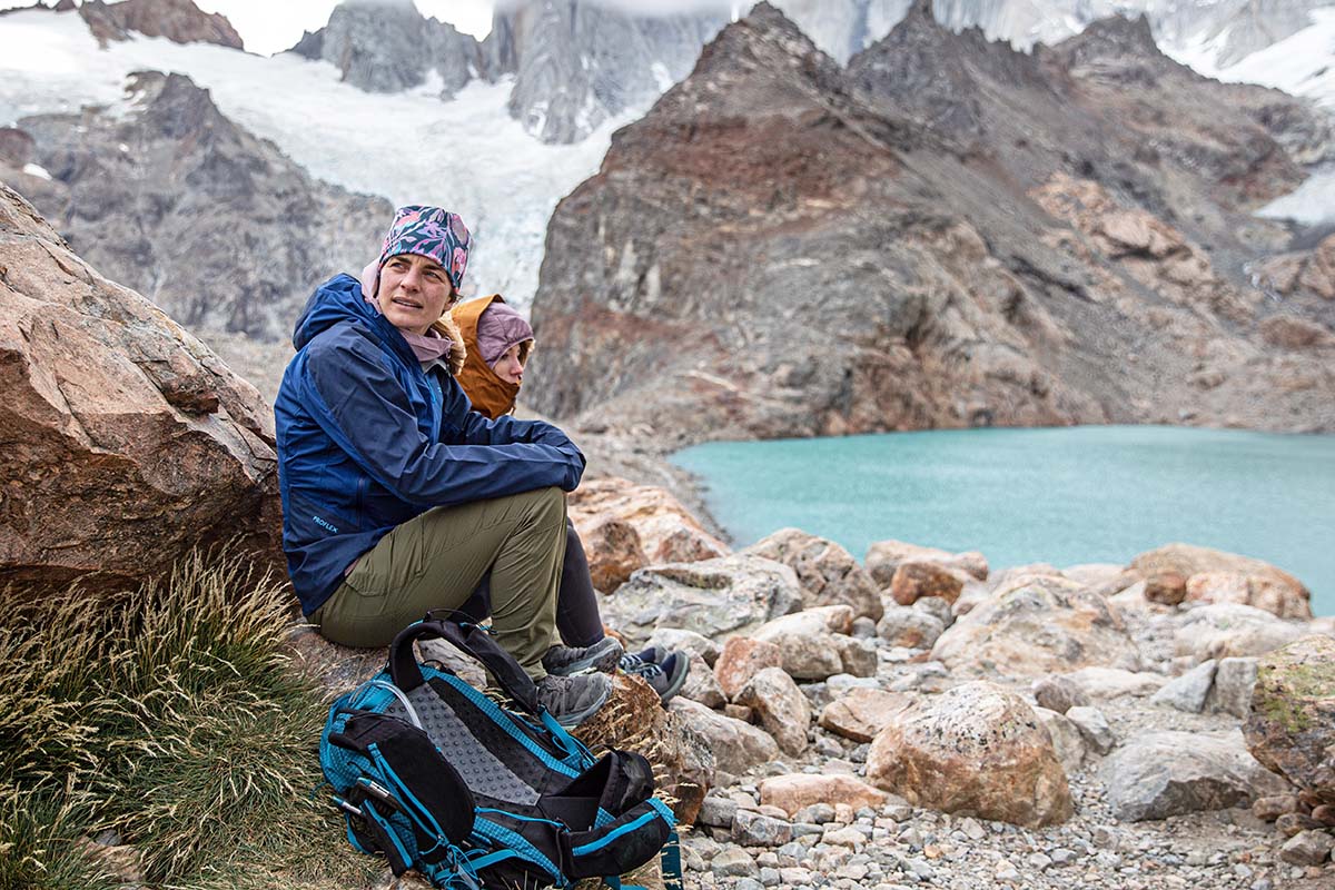 Rab Kinetic Alpine 2.0 jacket (sitting in front of lake and glacier)