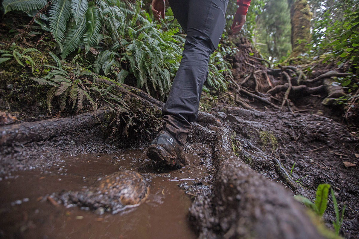 Salomon Cross Hike Mid GTX hiking boots (stepping through mud puddle)