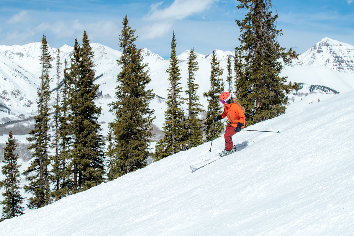 Salomon Stance 94 all-mountain ski (skiing next to trees)