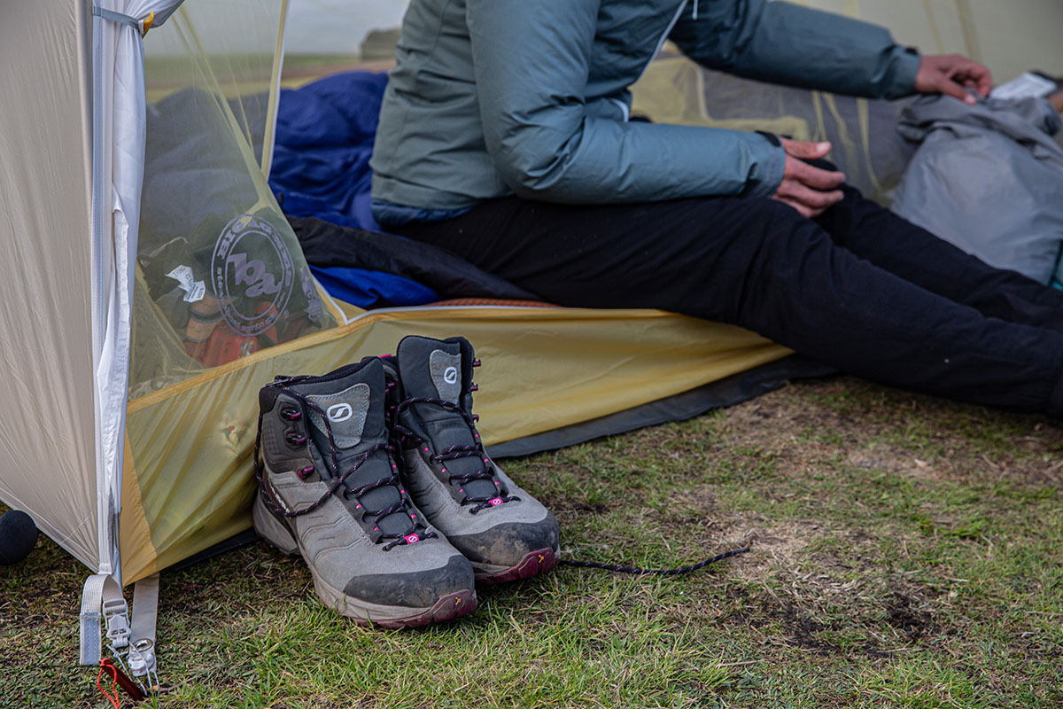 ​​Scarpa Rush TRK GTX hiking boot (sitting outside tent)