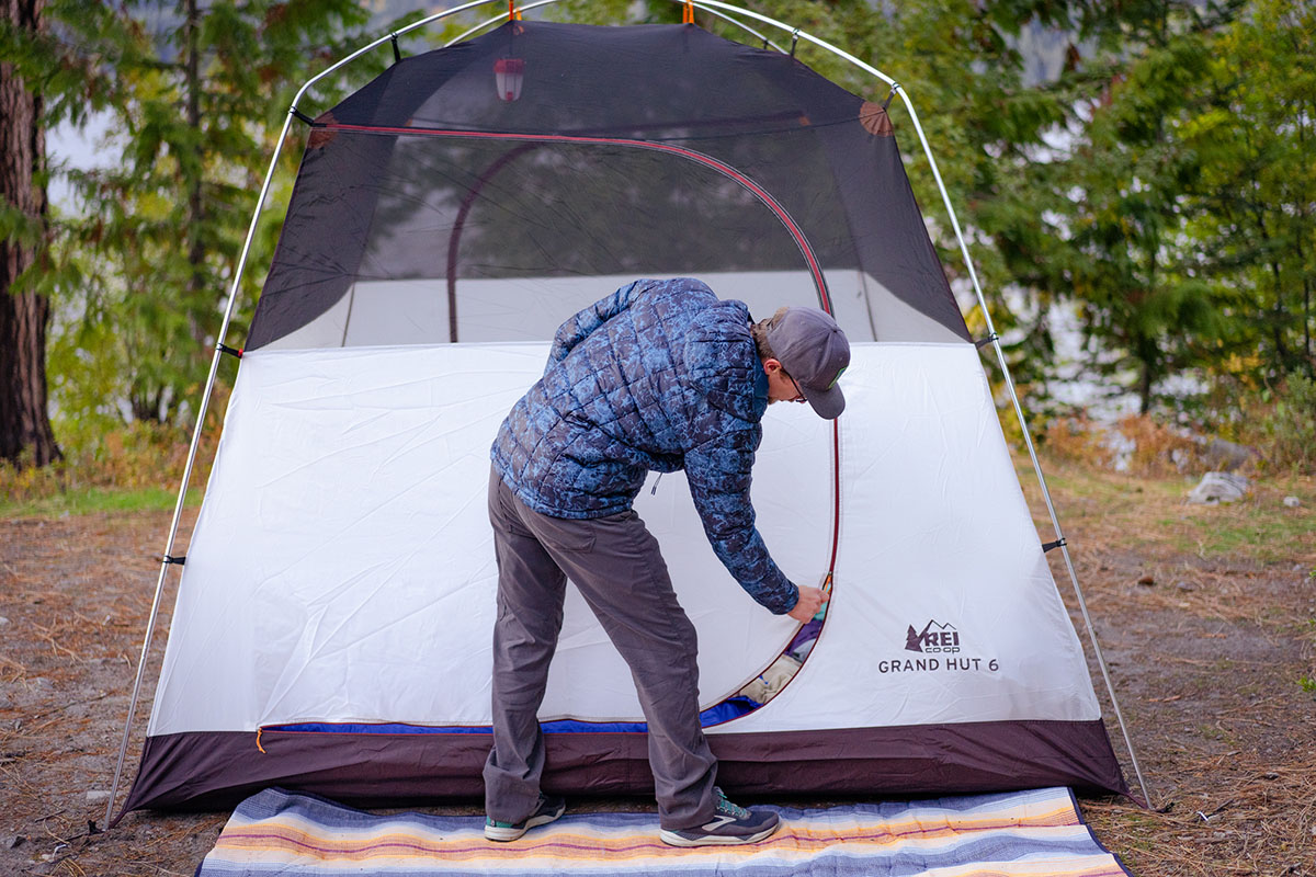 The North Face ThermoBall Eco Hoodie (zipping up REI Grand Hut 6 tent)