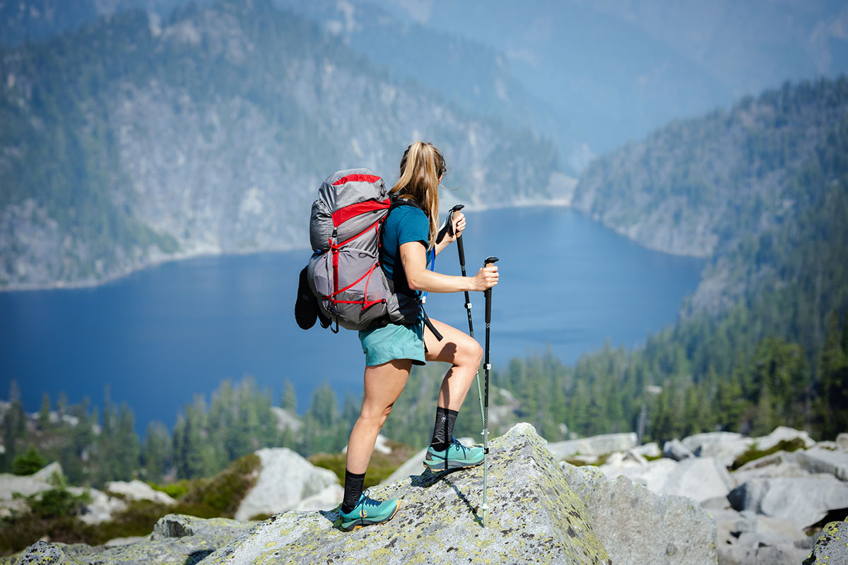 ​​Topo Athletic Ultraventure 3 (standing on rock above lake)