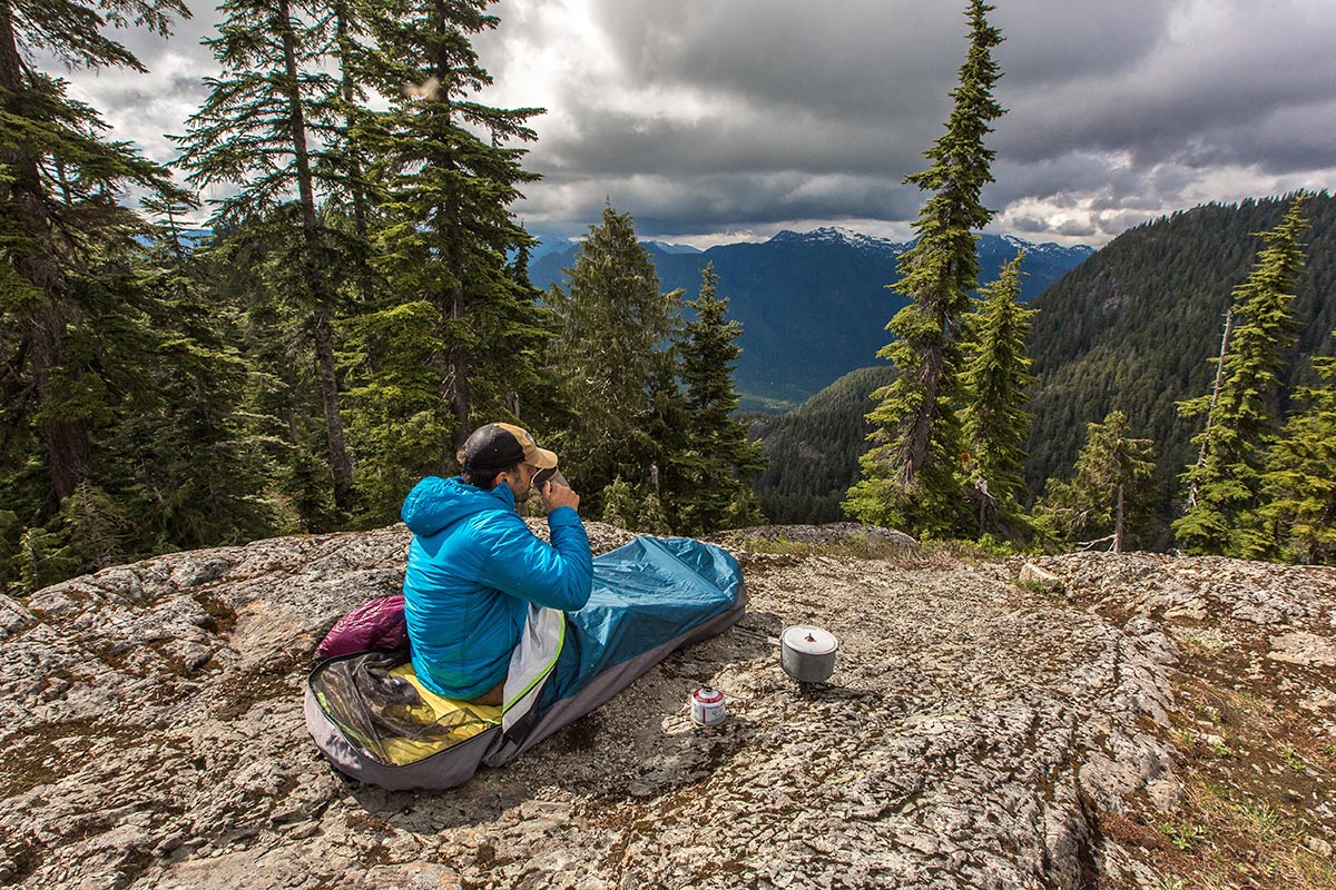 One-person bivy sack (sitting in OR Bivy overlooking mountains)