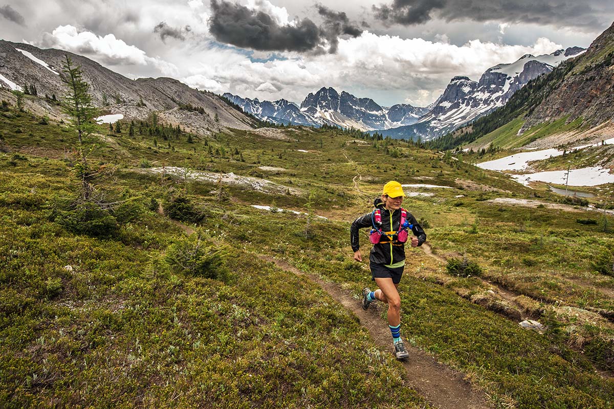 Trail running in the Arc'teryx Norvan rain jacket