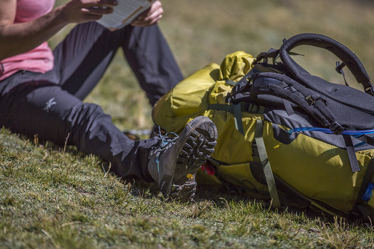 Hiking boot (Scarpa Zodiac Plus GTX next to backpack)