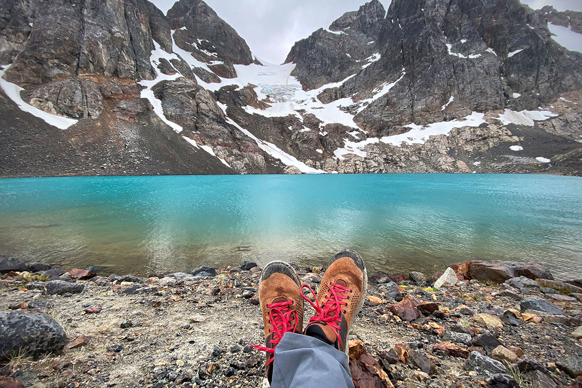 Hiking shoe (Danner Trail 2650 resting at alpine lake)