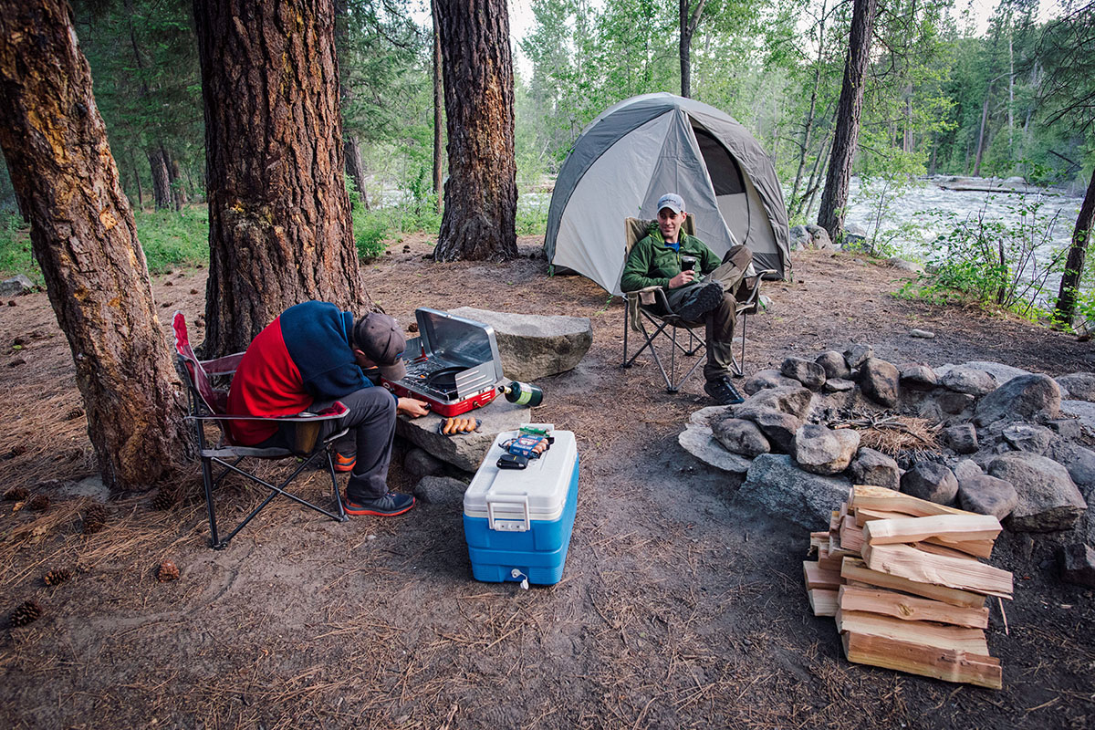 Camping gear (lighting stove at camp)