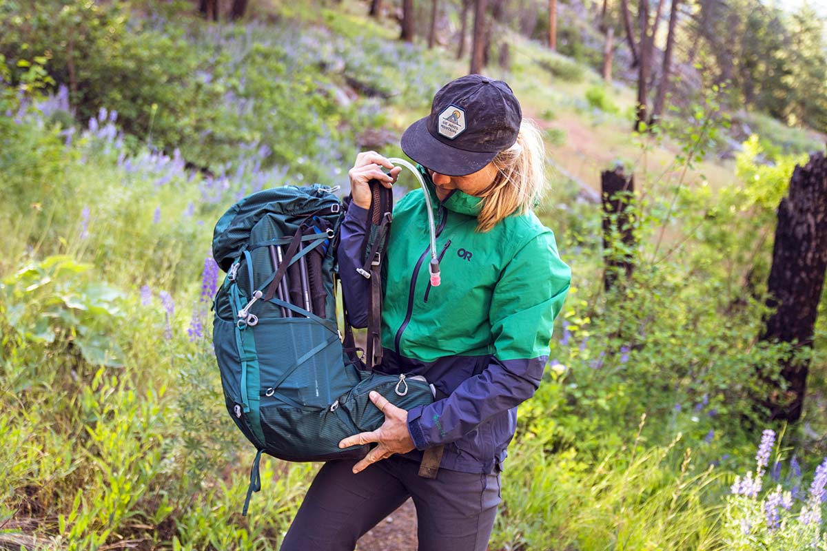 Putting on Osprey Eja backpack (Chelan Lakeshore Trail)