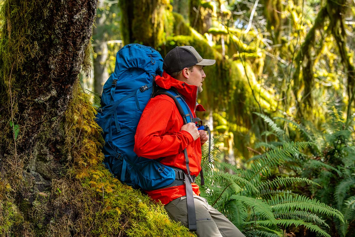 Sitting on mossy tree with backpack on (Hoh Rainforest)