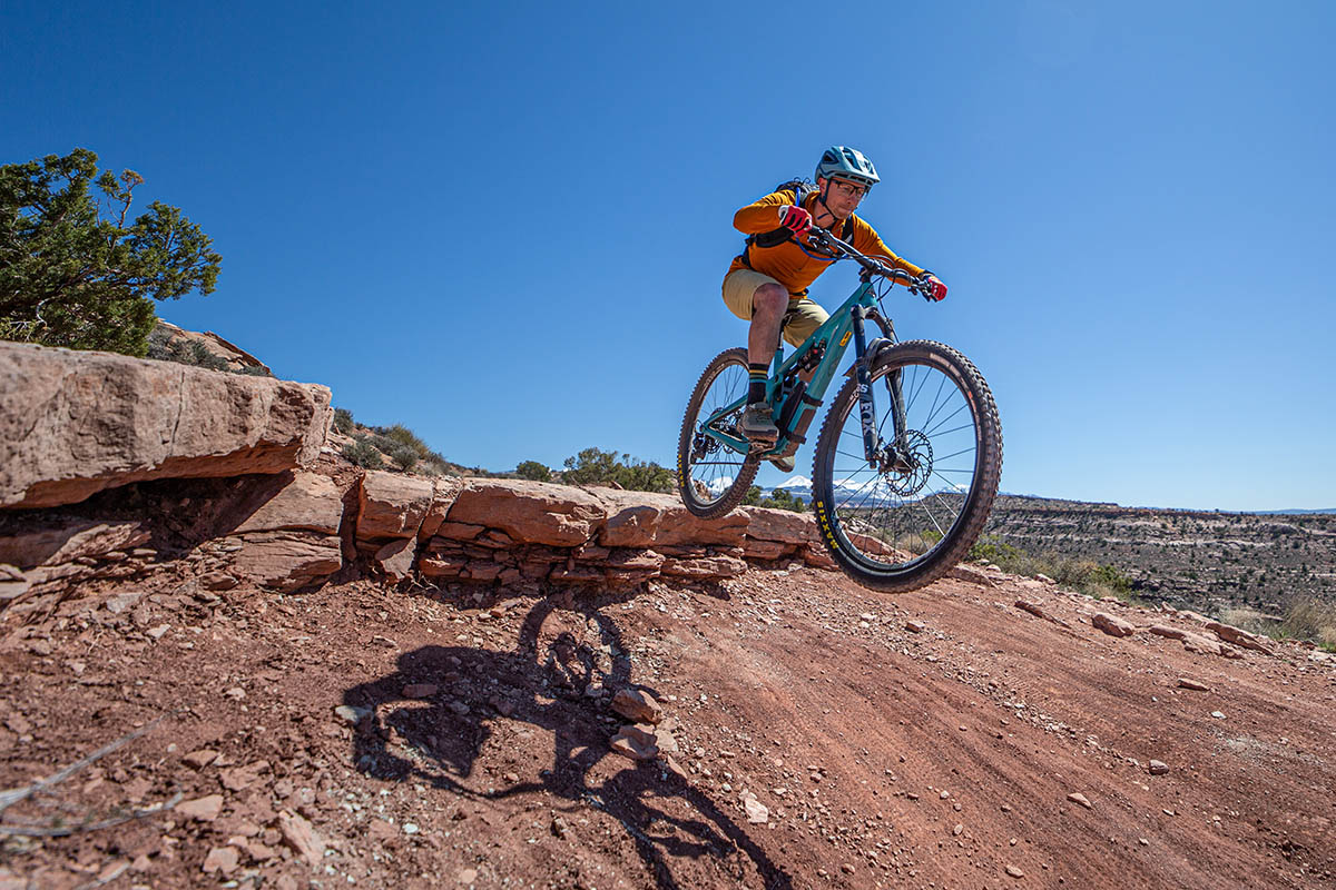 Yeti SB130 mountain bike (riding off jump)