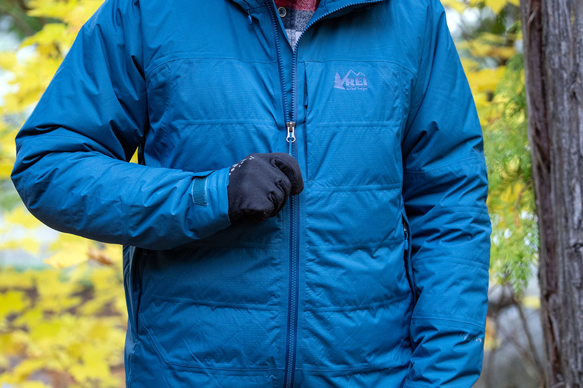 REI Holiday Warm Up Sale (zipping up REI Stormhenge Down Hybrid Jacket)