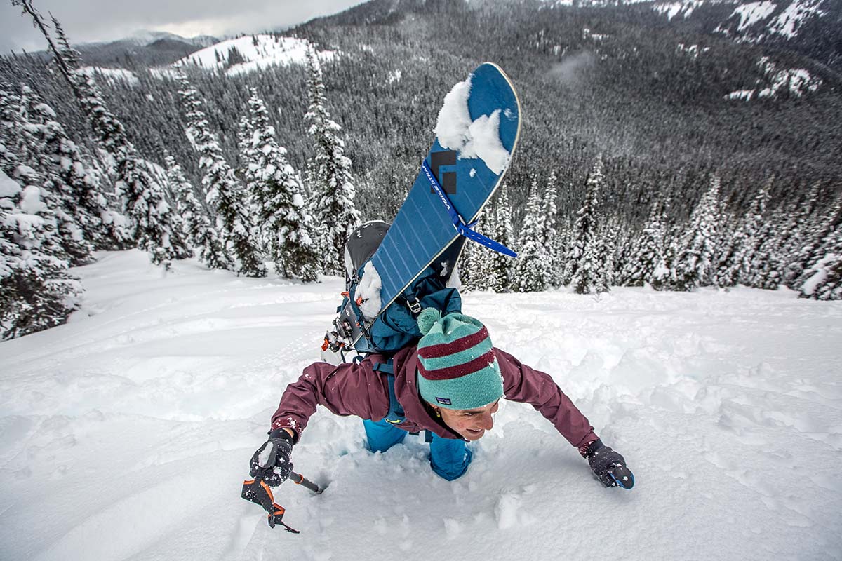 Bootpacking with skis attached to backpack (ski strap)