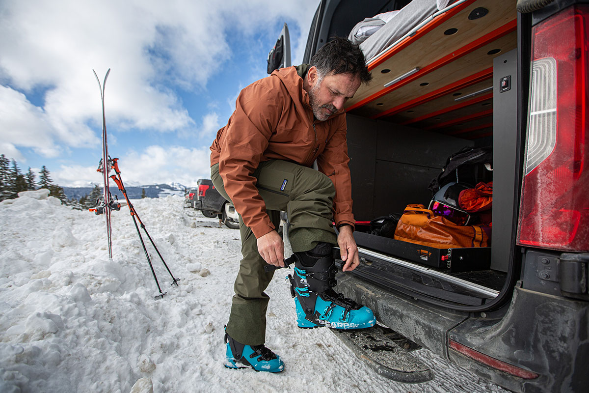 Ski gear (adjusting boots at van)