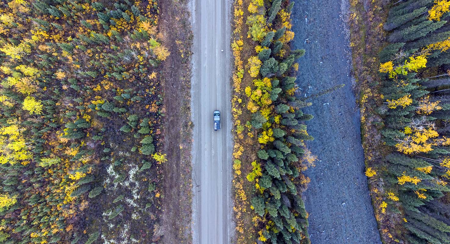 Aerial view of driving Dempster Highway in the fall