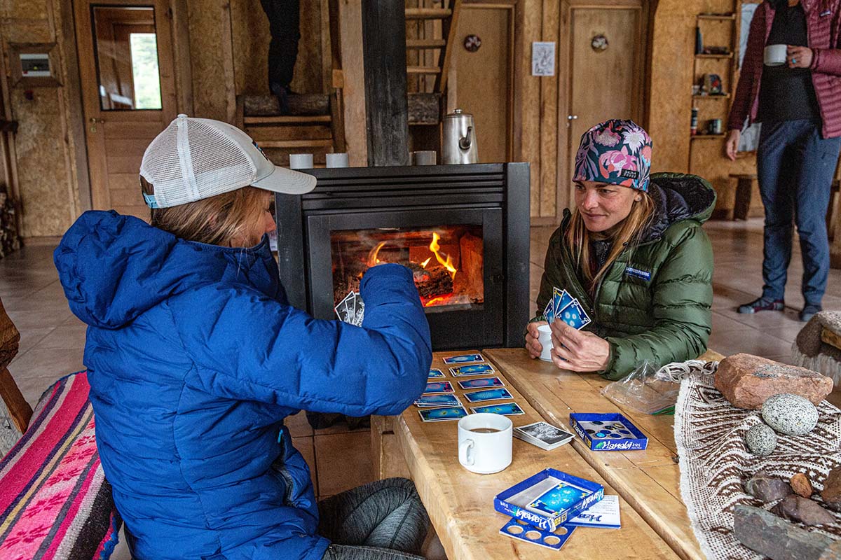 Playing cards by fire at refugio