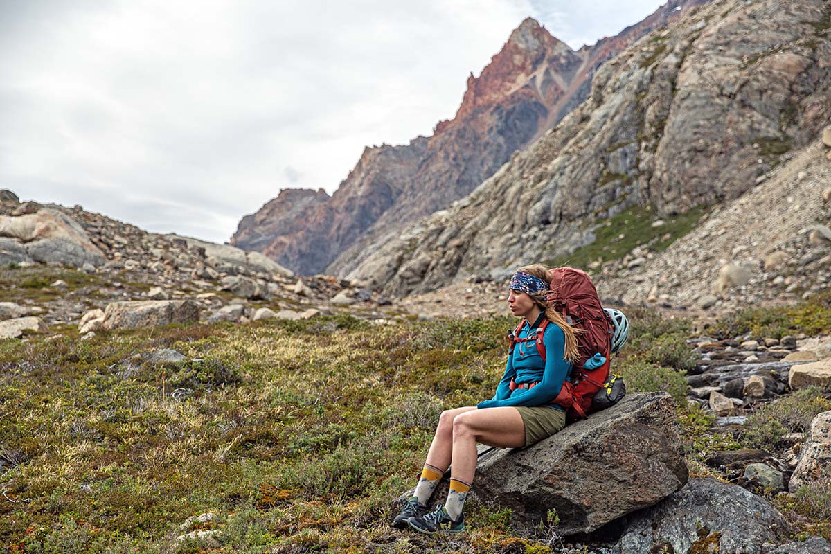 Sarah lounging on rock near Lago Electrico