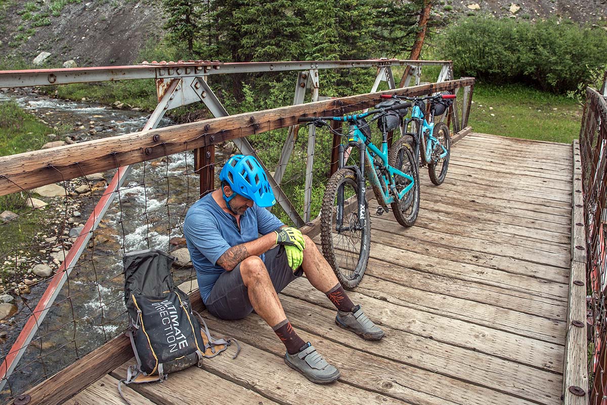 Resting on a bridge while bikepacking